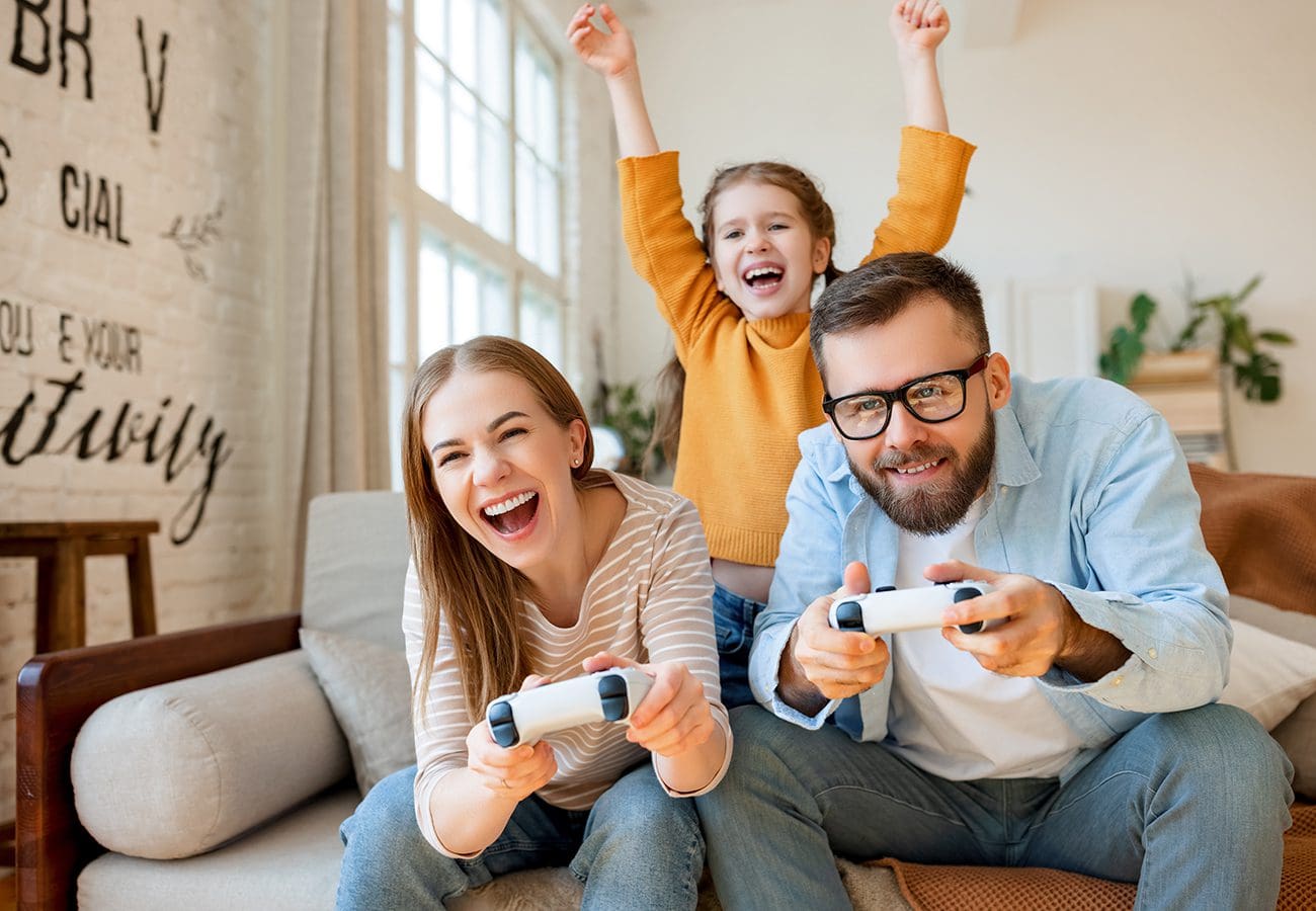 Young family playing video game